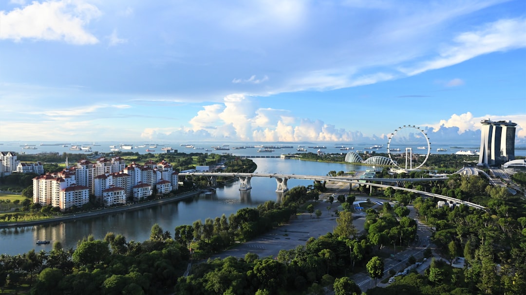 Singapore condominium development exterior, representing cross-market development exit lending in Asia